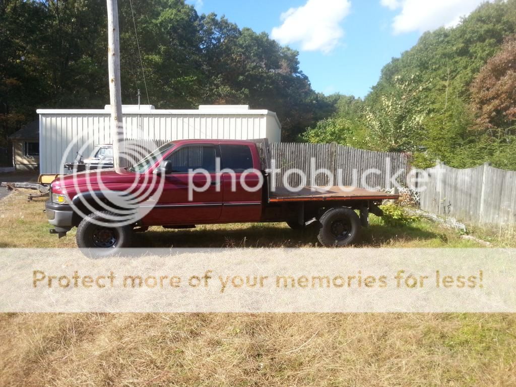 tire clearance under flatbed raise bed or add wheel wells? Cummins